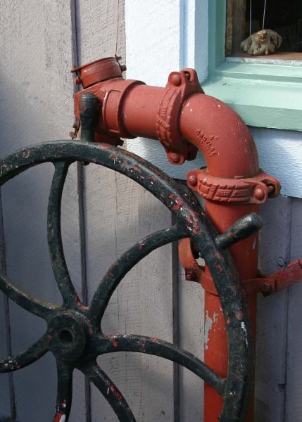 Pipe, Wheel and Bird by Tom Borgal Photography